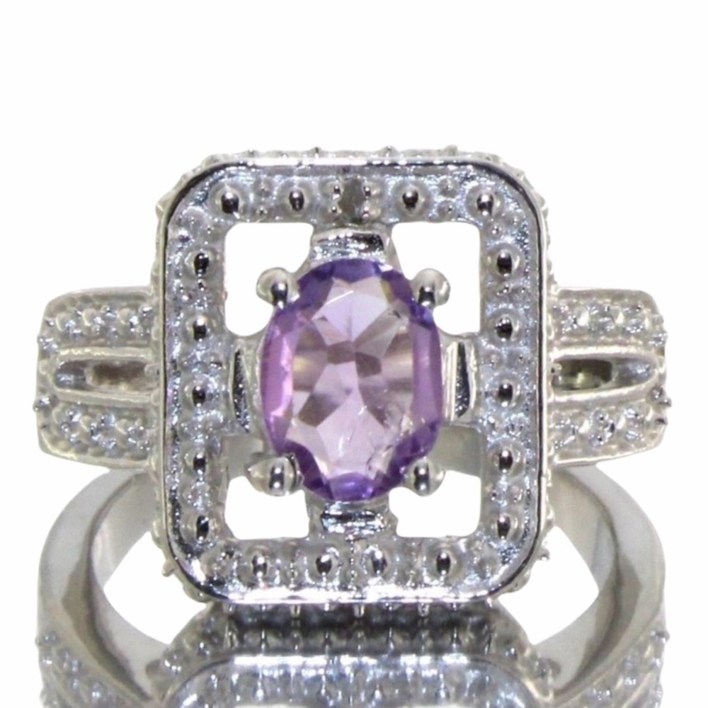 Natural oval 1.21 carot amethyst & diamond ring